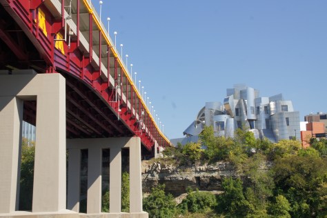 The view from Bohemian Flats is quite a contrast to the site's 19th Century origins with the futuristic Weisman Art Museum, designed by Frank Gehry, atop the river bluff.